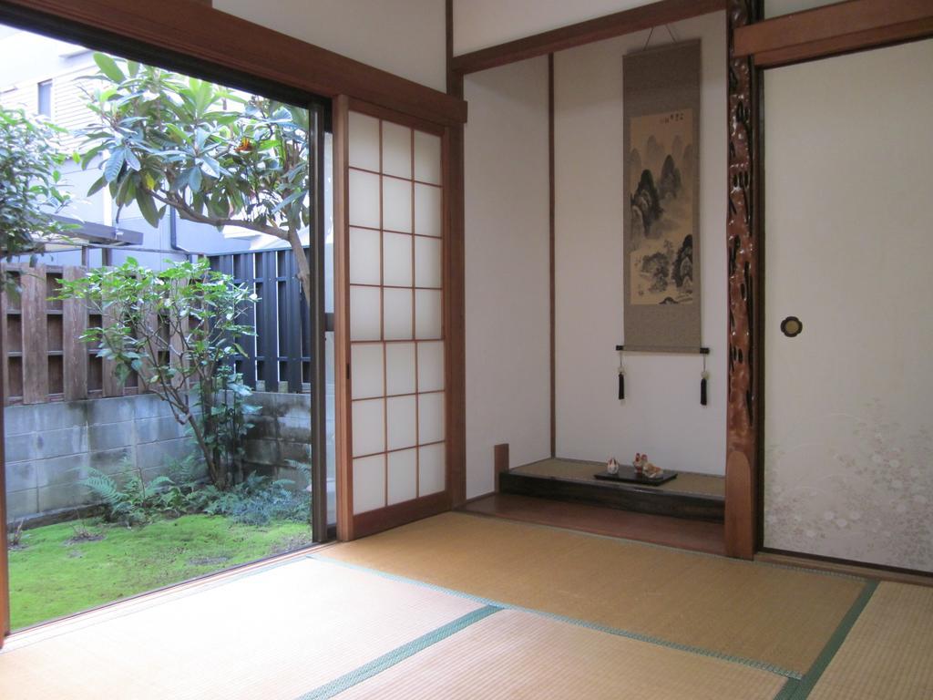 Enman Guest House Osaka Moriguchi Bagian luar foto
