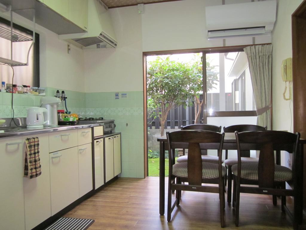 Enman Guest House Osaka Moriguchi Bagian luar foto